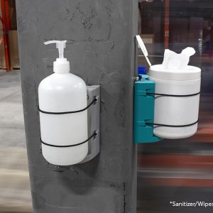 sanitizer bottle in a sanitizer wall mount bracket in a warehouse